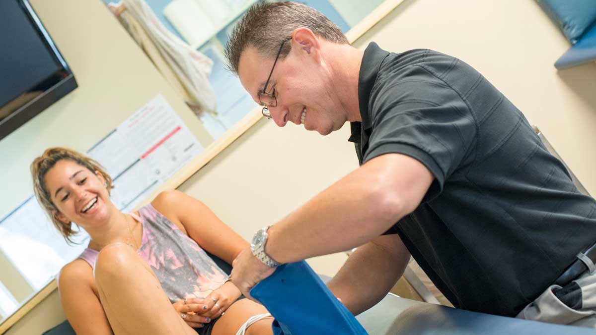 Toms River NJ Physical Therapist, Steve Lally works with a patient