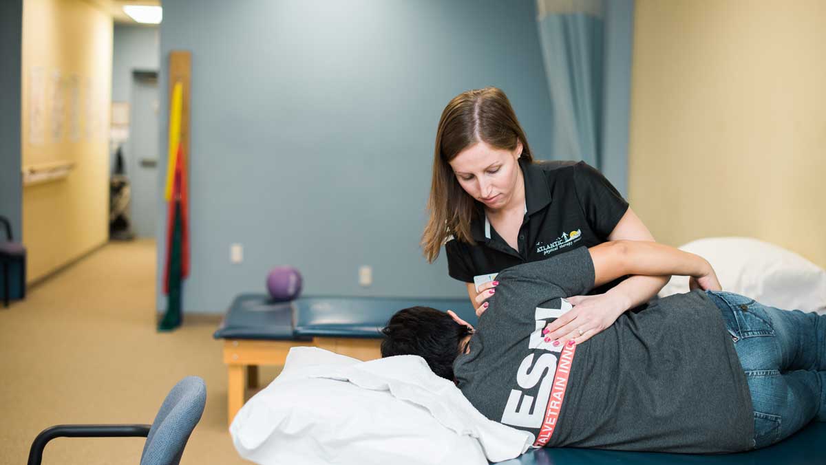 Toms River NJ Physical Therapist, Jessica Coladonato working with a patient