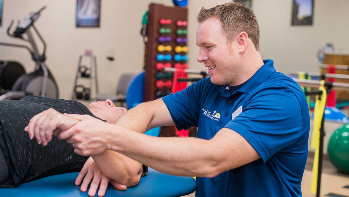 Oakhurst NJ Physical Therapist, Brad Czaszynski working with a patient
